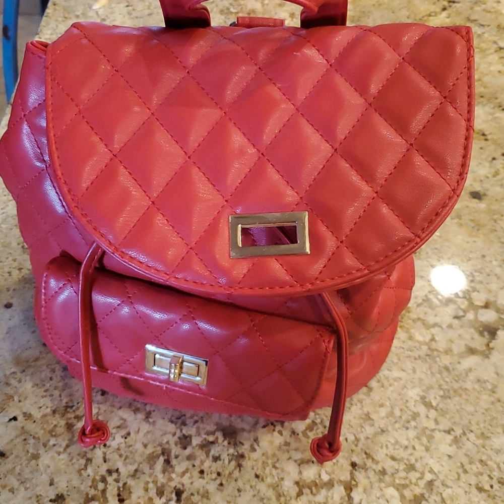 Red quilted backpack